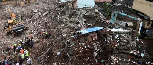 Zeci de oameni blocați sub dărâmături după prăbușirea unei clădiri în India | VIDEO