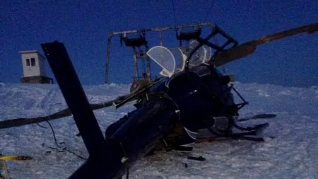 Elicopterul unui milionar român s-a făcut praf, după ce vântul l-a izbit de o pârtie de schi de pe Muntele Mic