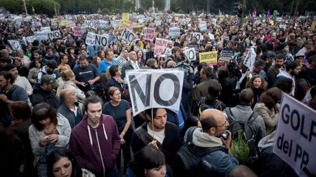 SPANIA este pregătită să solicite AJUTOR FINANCIAR, Germania îi cere să aștepte