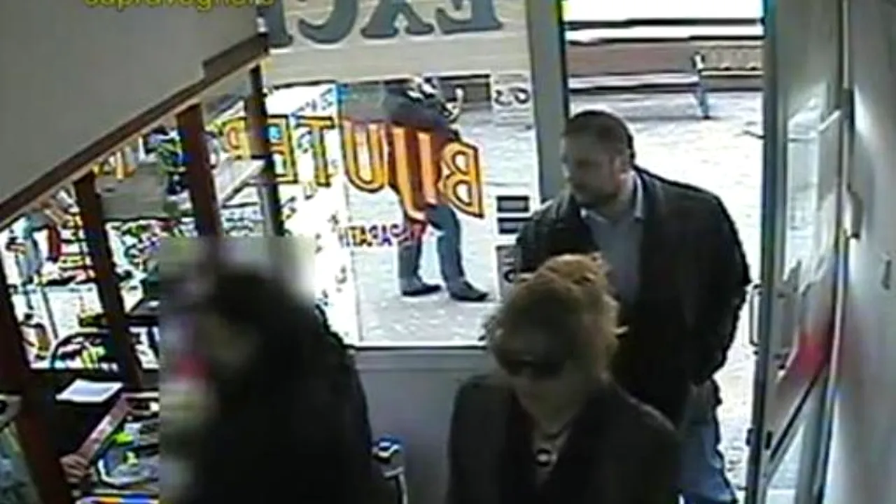 VIDEO Primele imagini cu cei doi escroci care au plecat cu 100.000 de euro dintr-o casă de schimb valutar