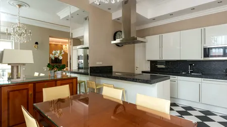 La ce distanță se pune hota de aragaz? Mulți români greșesc