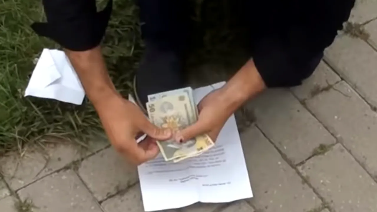 Polițist Timiș prins flagrant luare mită