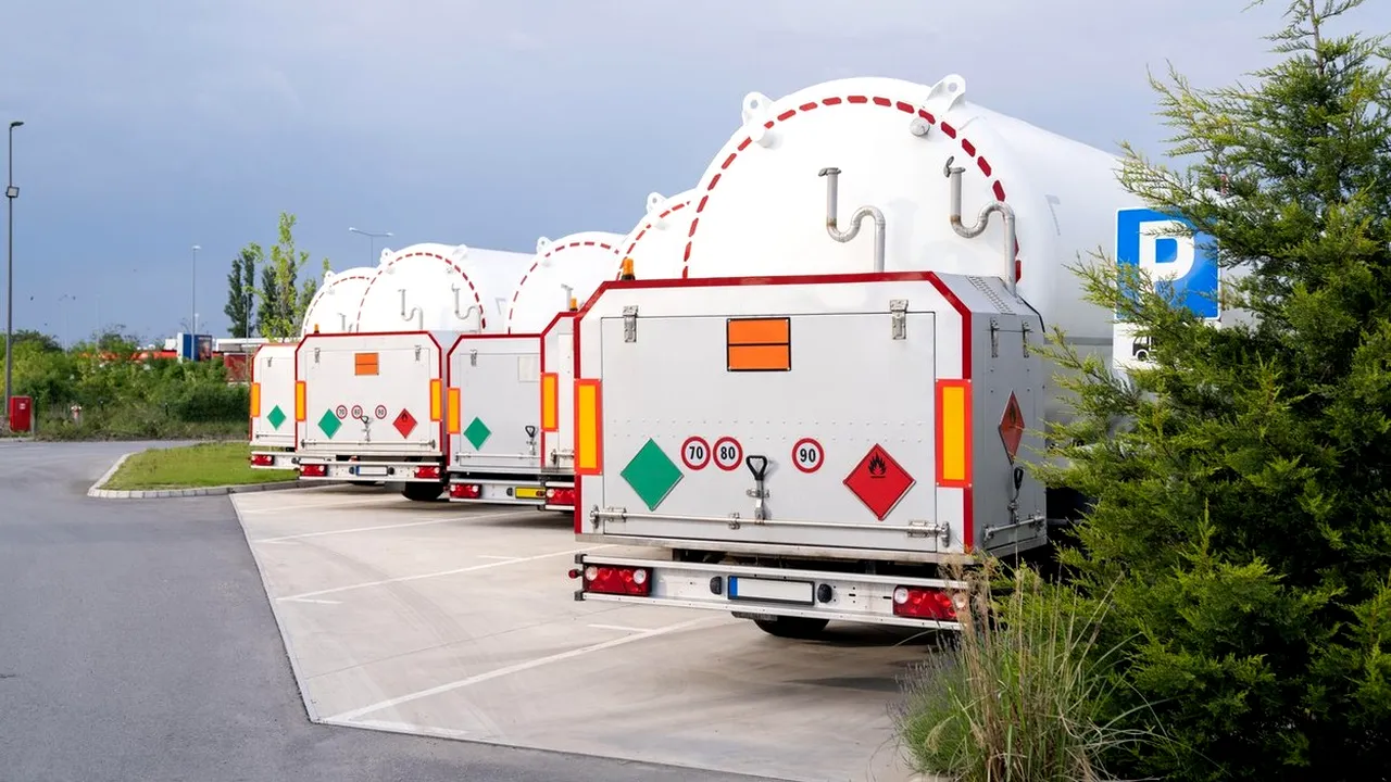 Tank trailers stand in a row. LPG transportation 