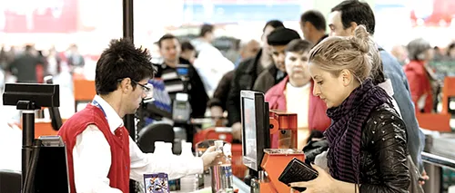 Câți bani primește SALARIU un român care lucrează casier în supermarket-urile Carrefour din Spania