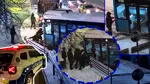 Imagini cu un autobuz STB ajuns într-un gard din cauza zăpezii. Câţiva oameni încearcă să-l împingă cu mâinile