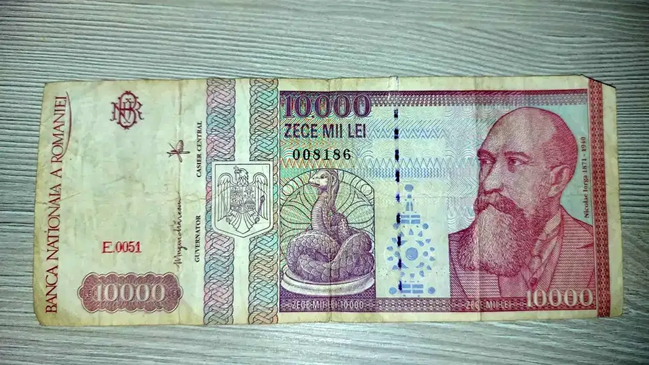 Ai așa ceva acasă?! Suma colosală cu care se vinde o bancnotă de 10.000 de lei cu chipul lui Nicolae Iorga