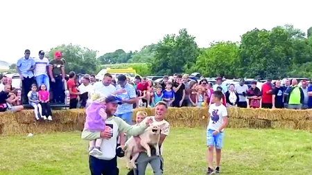 Un nou SPORT face senzație într-o localitate din Vaslui. Copiii concureaza la PRINSUL purcelului