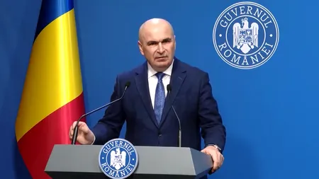 După ce a eșuat cu TVA-ul mărit și cu inflația, acum Bolojan se întrece în noi promisiuni: deficit de 6,2% și inflație de 4%