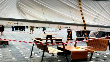Român lovit în cap de o umbrelă de la McDonald's, bun de PLATĂ! A fost obligat să achite 2.000 de euro